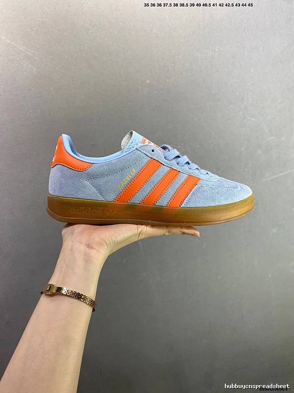 Adidas Light Blue and Orange Low-Profile Sneakers Highlighting Rounded Toe