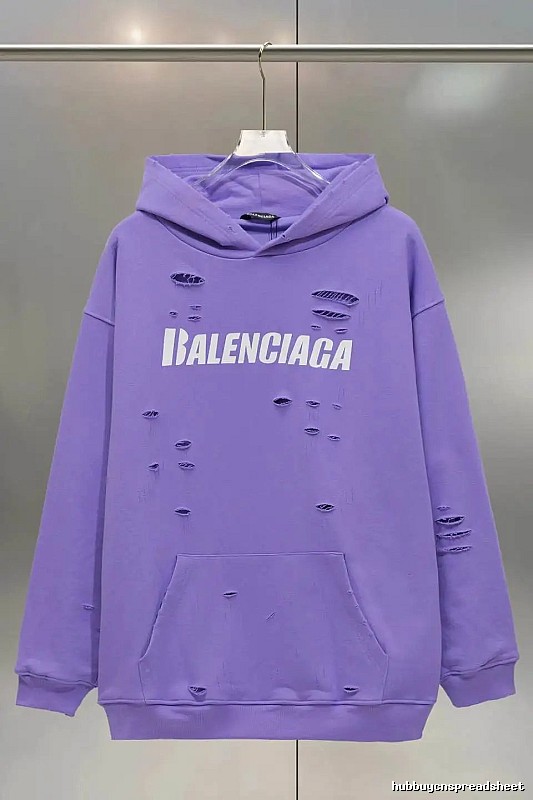 Balenciaga's ripped purple sweatshirt