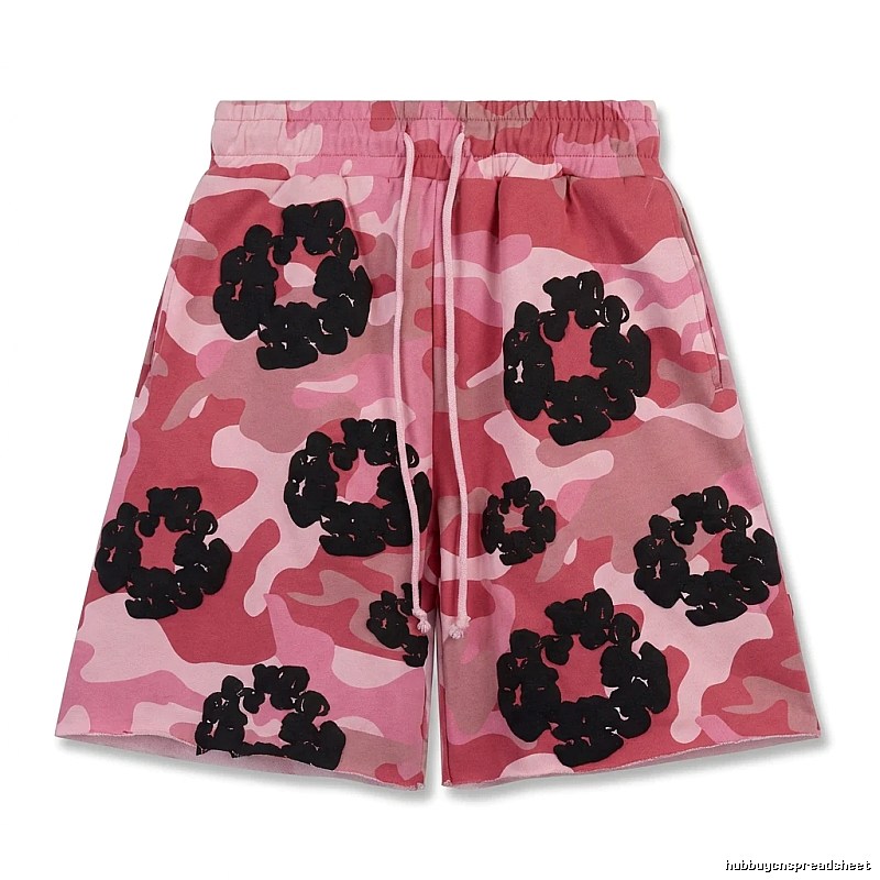 DENIM TEARS camouflage-style shorts