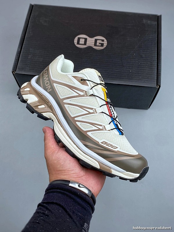 Salomon Tan and Gray Trail Runners Defined by Treaded Trail Sole
